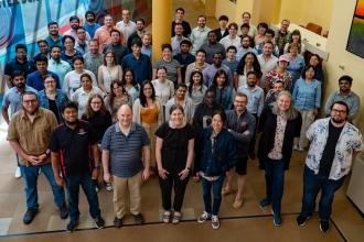 Group photo of the 2025 OSG School participants and staff